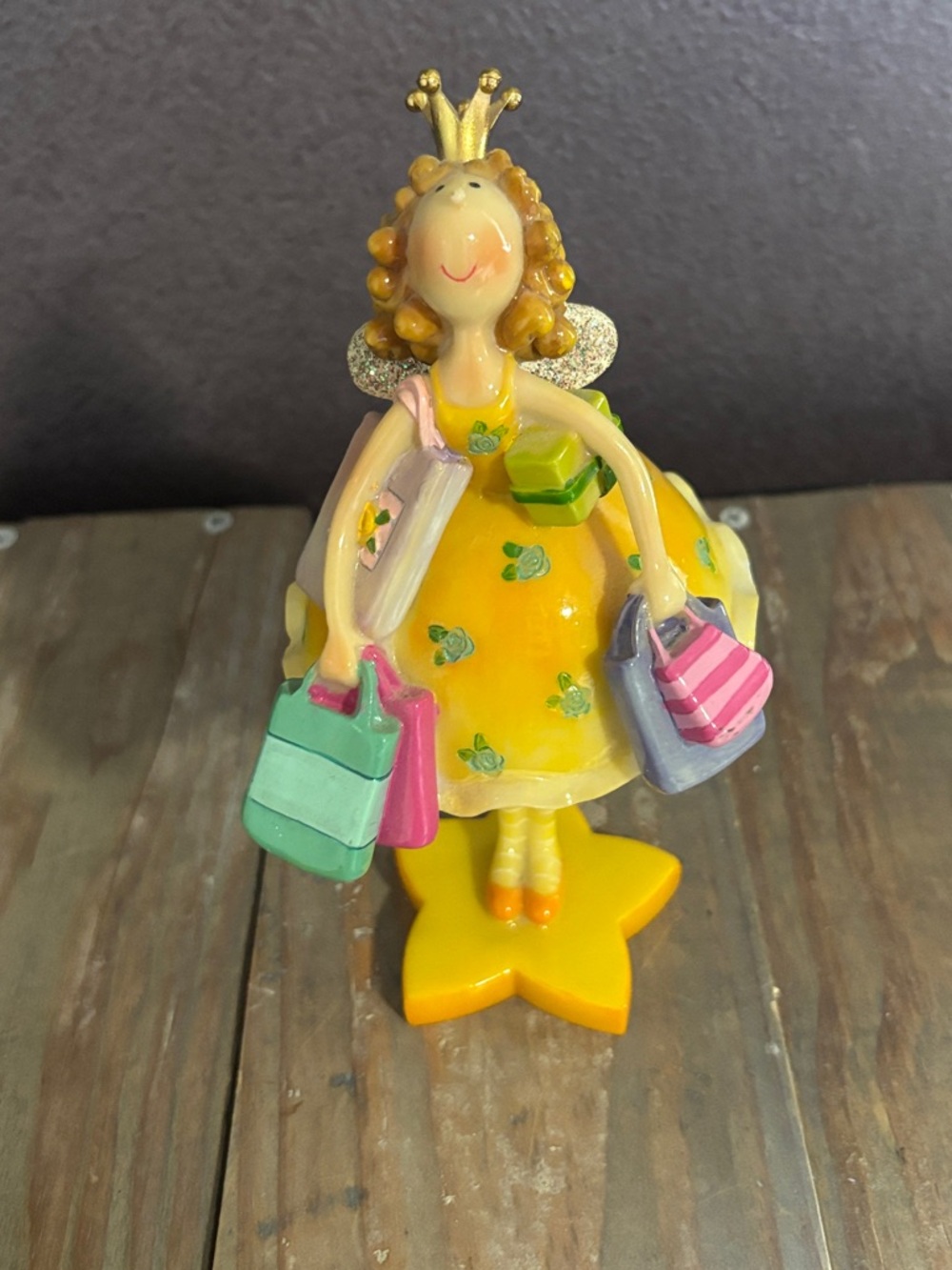 Yellow Princess Figurine with Shopping Bags